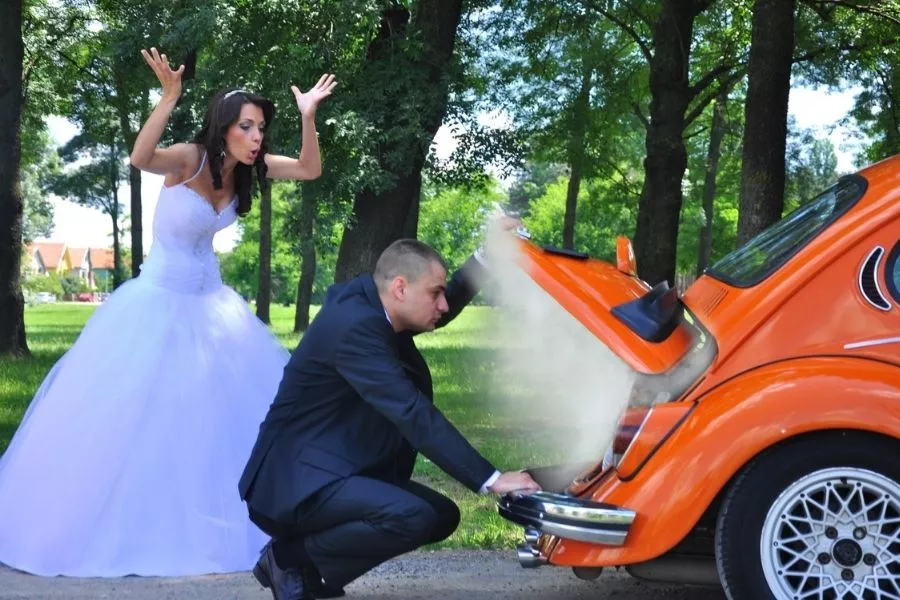 Newlyweds stalled car