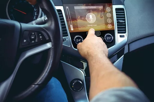 man using car stereo