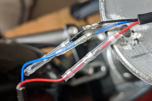 Electrical grade solder and a soldering iron.