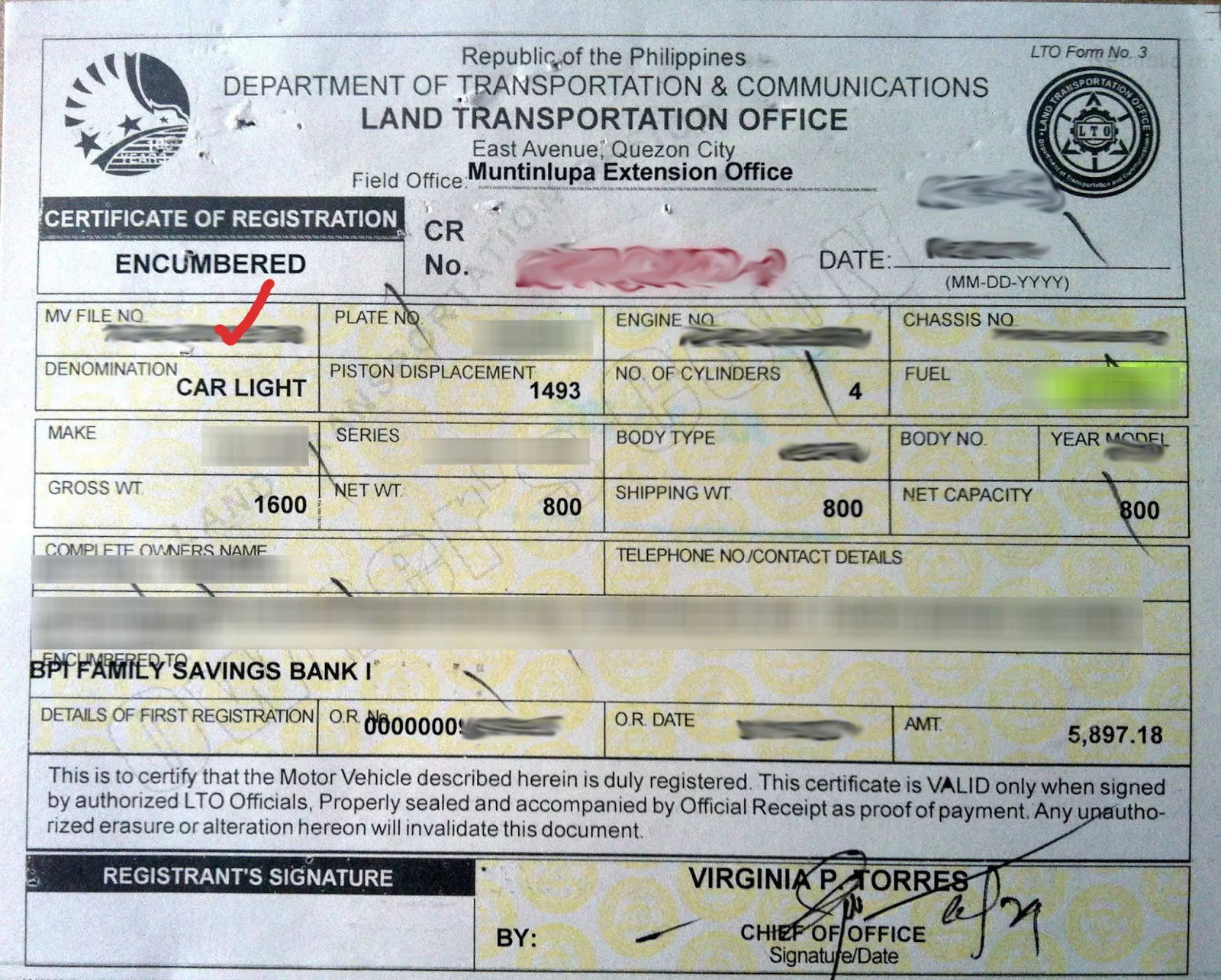 See that box with the red check mark, that's a car's MV file number A picture of a car's certificate of registration