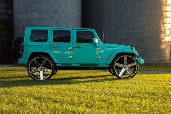 If you have money to afford these dubs, fuel economy shouldn't be a priority wrangler with crazy dubs