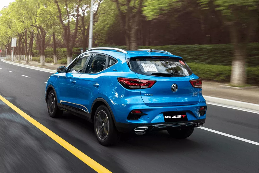 A picture of the new ZS-T's rear end as it travels over a road.