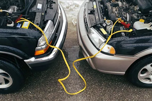 electric wire transferring electricity between two cars