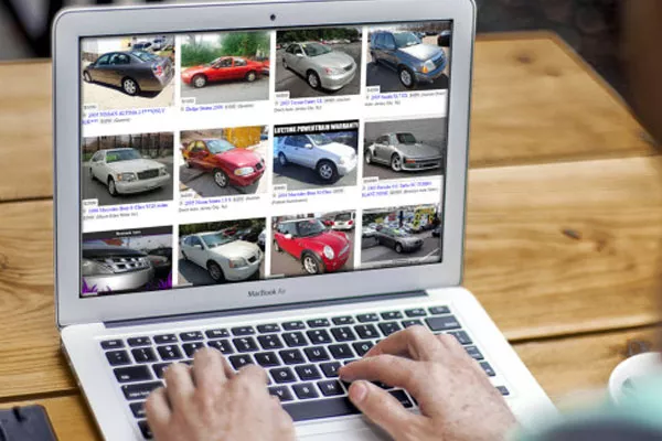 a person buying cars online