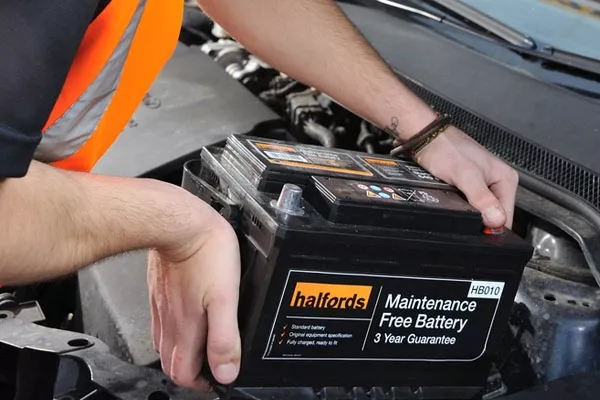Car battery being removed