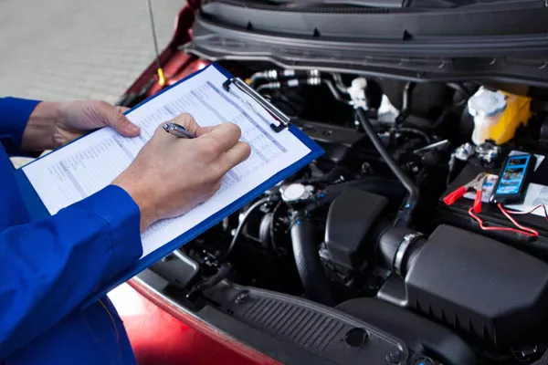 a car undergoing maintenance check