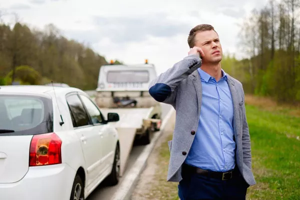 a man calling his mechanic