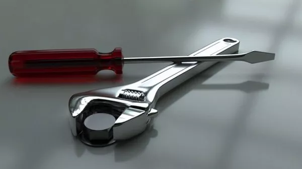 a wrench and a screwdriver