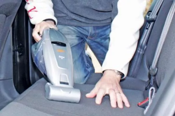 You have to use a vacuum cleaner to complete this task Cleaning car seats' surface by a vacuum cleaner