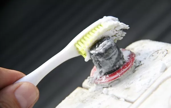 old toothbrush cleaning car battery terminals