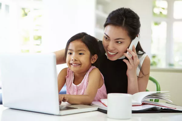 mom and daughter researching