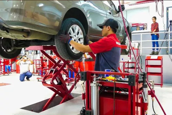 A man changing tires