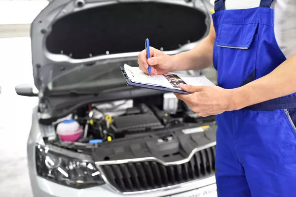 Mechanics note down car's problem