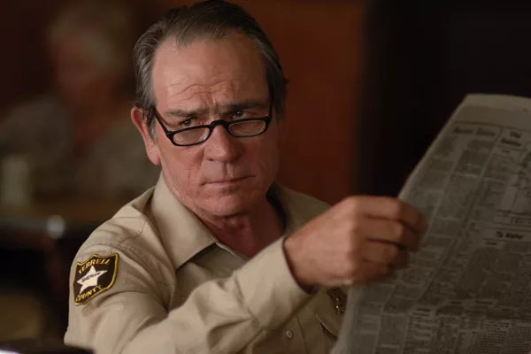 A police officier reading newspaper