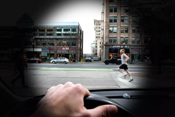 Driving a car out of a parking lot