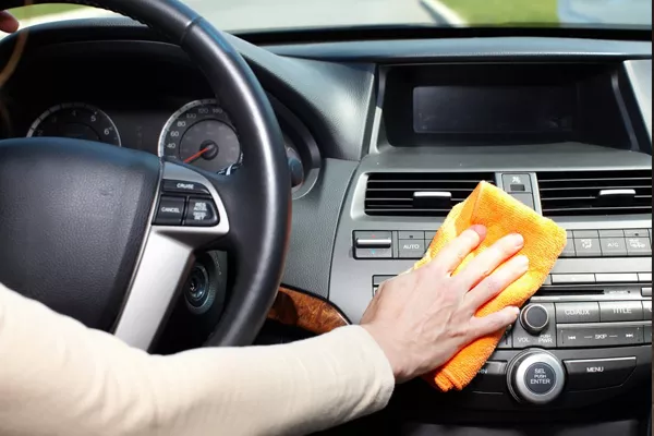 Cleaning a car's dashboard