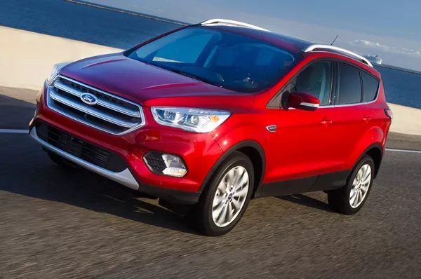 A red Ford Escape 2017 on the road