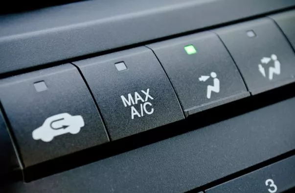 Once the car windows are rolled up, it’s now time for you to start the air conditioning air conditioner button in a car