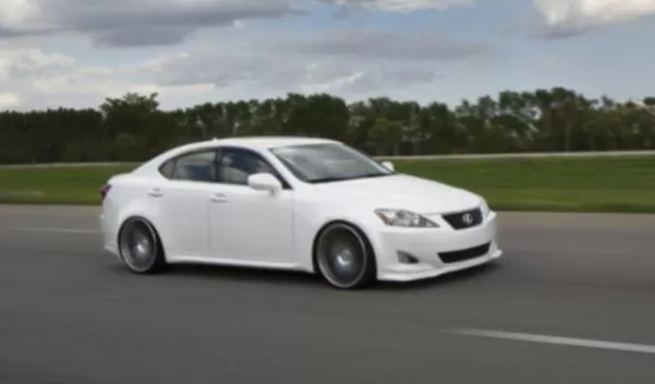 white car on road