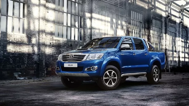A blue Toyota Hilux angular front view
