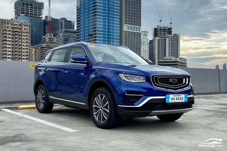 A picture of the Geely Azkarra parked on a rooftop lot.