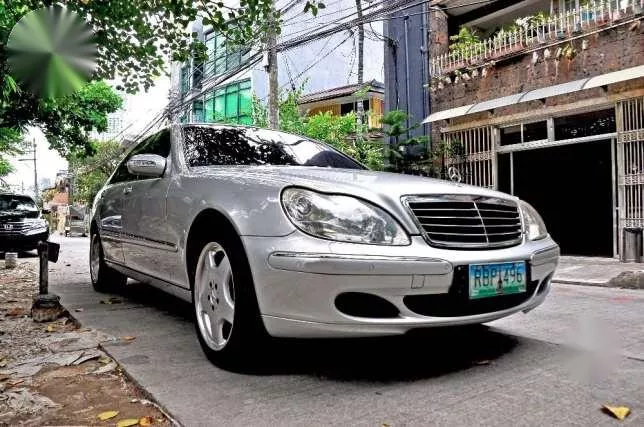 A silver Mercedes-Benz S-Class angular front view
