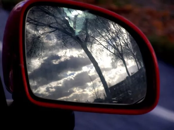 The passenger side mirror on modern cars is more convex passenger side mirror