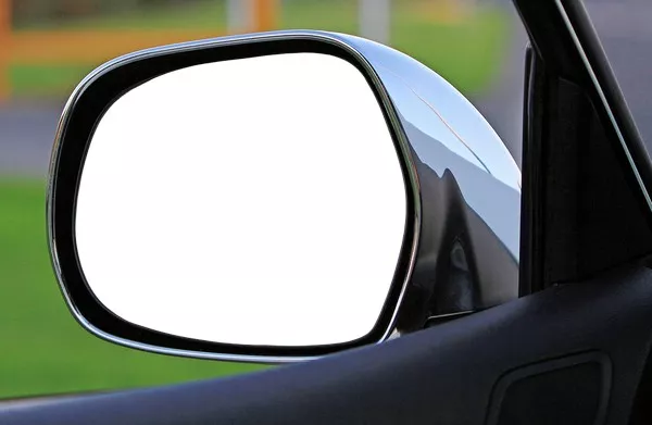 Your driver side mirror should show nothing of your car's view driver side mirror