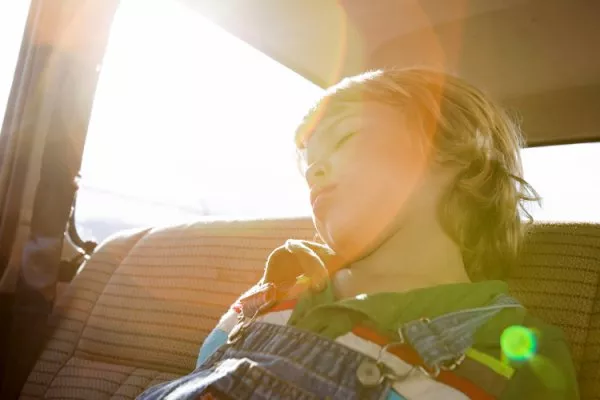 Leave children alone in car can cause the heat stroke. Baby is sleeping in car