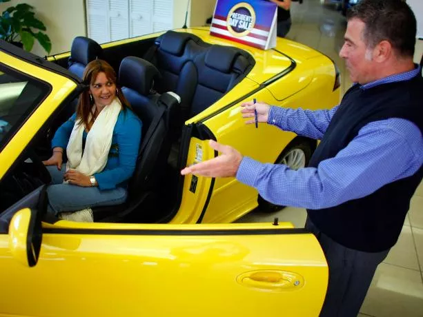 A girl ready for a car test drive