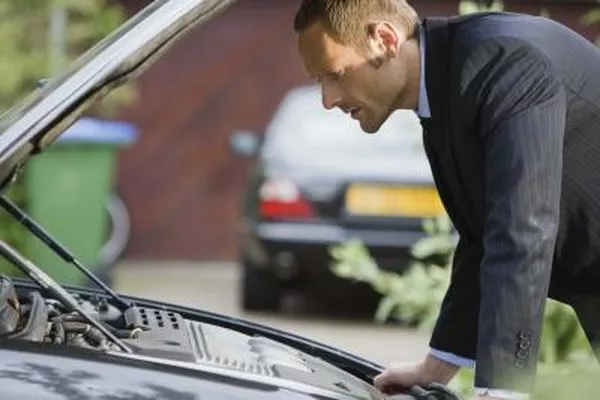 Inadequate cooling will cause the engine to overheat Checking a car engine for overheating