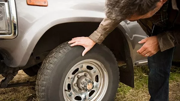 Checking a car tire