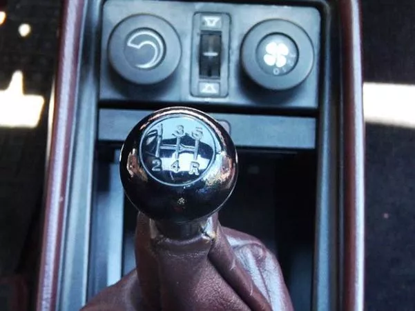 Pull the handbrake and switch the gearbox to P a gear stick