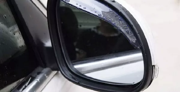 Rainproof cover for rearview mirrors on a car