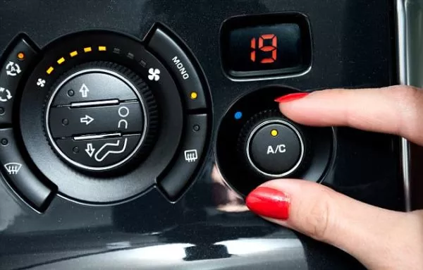 turning on car air conditioning system