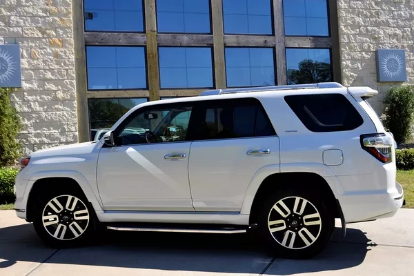 Some owners limit their window tint to just the rear glass a car with window tint on the rear glass