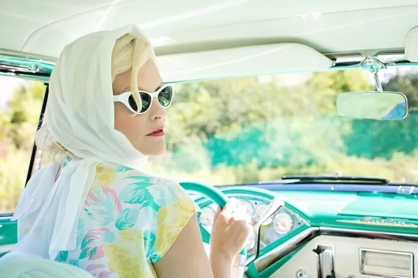 a woman in a car without window tint