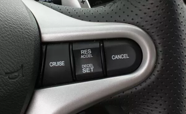 cruise control button in a car