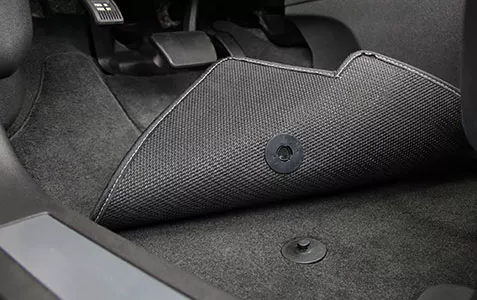 Remove the foot mats and check for any moist and wet spots. Foot mats