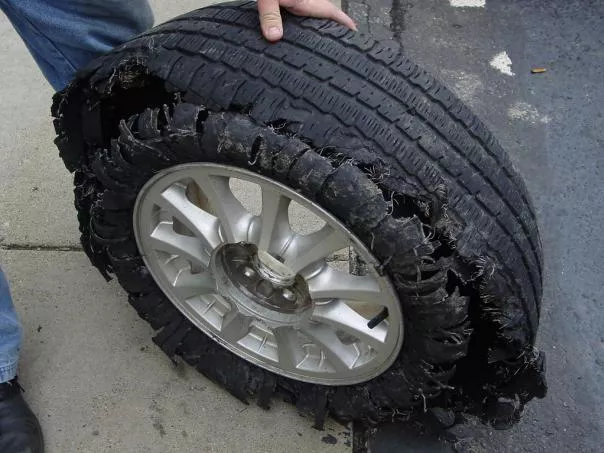 a totally damaged tire