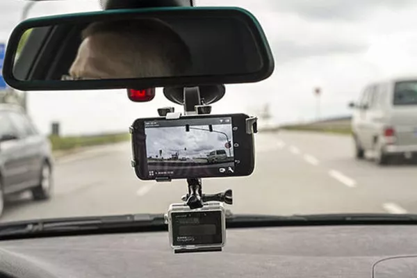 Action camera converted into dash cam with connected mobile
