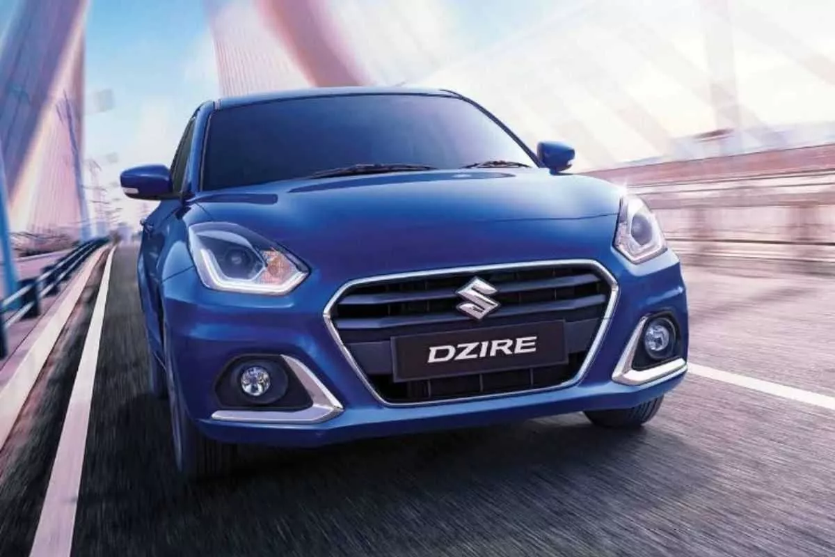 A picture of the Suzuki Dzire on a bridge