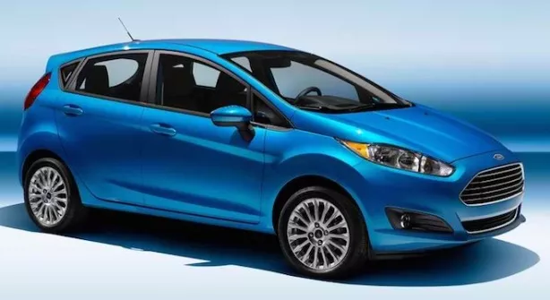 A blue 2017 Ford Fiesta side view 
