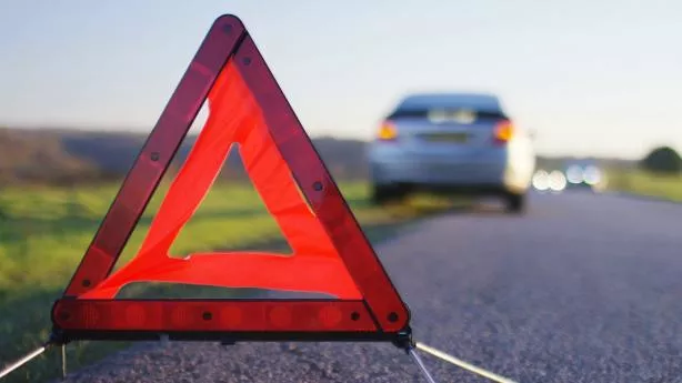 A hazard warning sign on the road