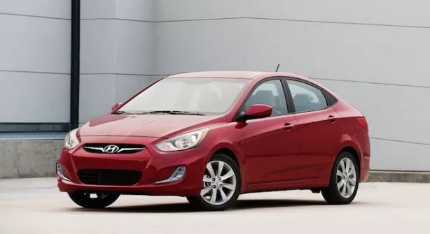 A red 2017 Hyundai Accent angular front view