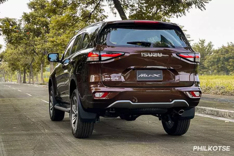 A picture of the rear of the Isuzu mu-X while it's parked on a road.