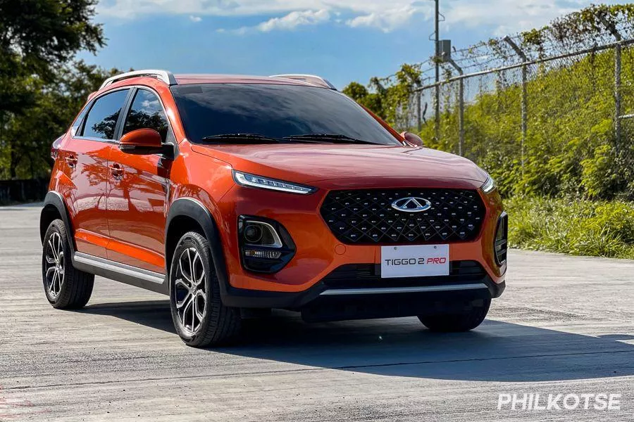 A picture of the Chery Tiggo 2 parked near a wooded area