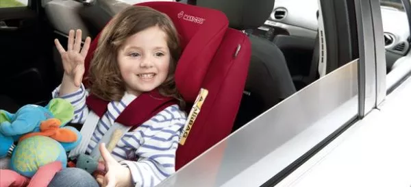 Give children something to play with such as toys. Baby with toys in car