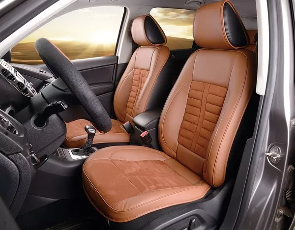 Leather seats can be uncomfortable in hot weather and prone to damage Leather seats in a car
