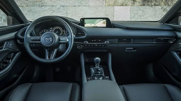 A picture of the front cabin of the Mazda 3